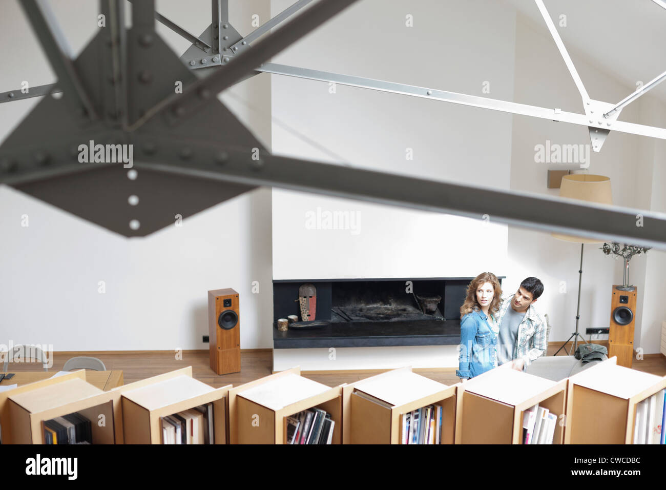 Couple in a studio apartment Stock Photo - Alamy