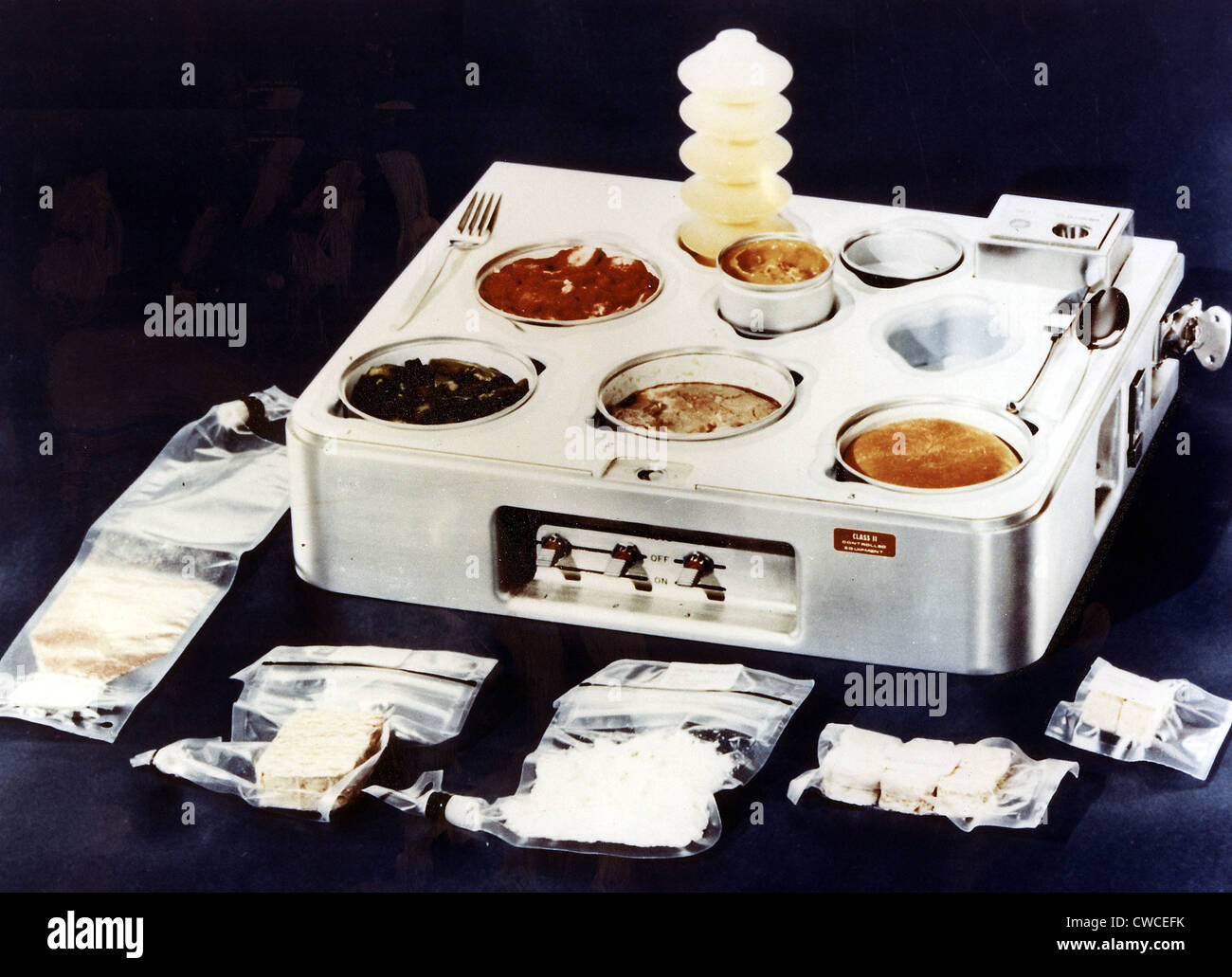 Skylab food heating and serving tray with food, drink, and utensils