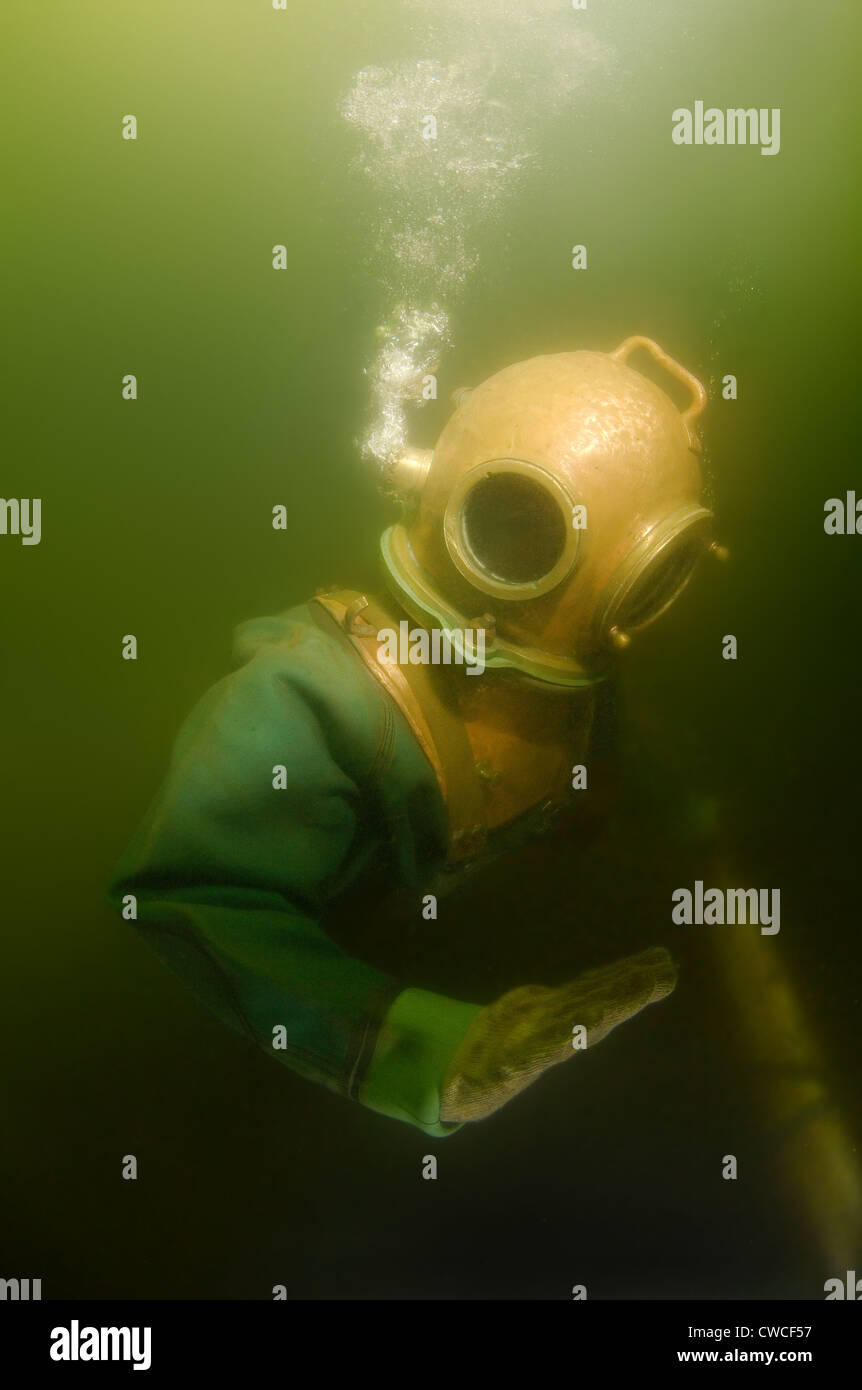 Professional diver checks the pipeline. Japan sea, Far East, Primorsky Krai, Vladivostok, Russian Federation Stock Photo