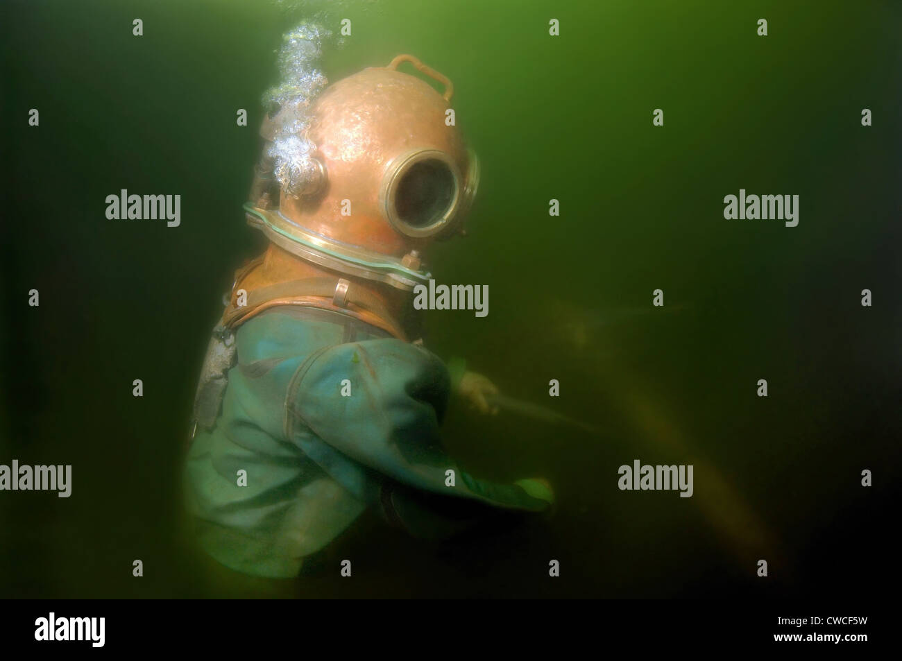 Professional diver checks the pipeline. Japan sea, Far East, Primorsky Krai, Vladivostok, Russian Federation Stock Photo