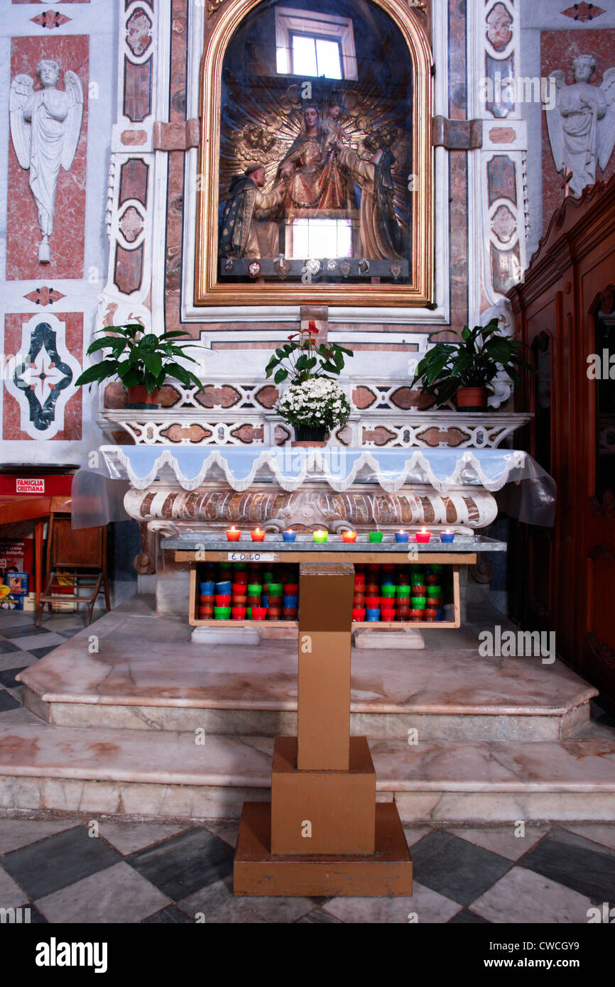 Church in Finalpia: Chiesa abbaziale benedettina "Nostra Signora Assunta" di Finale Ligure Pia con campanile secolo XII Stock Photo