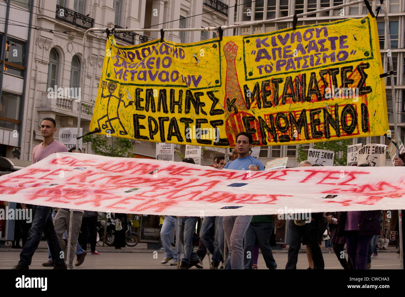 Immigrants march in Athens to protest against racism and attacks by members of the neo-nazi party Golden Dawn. Stock Photo