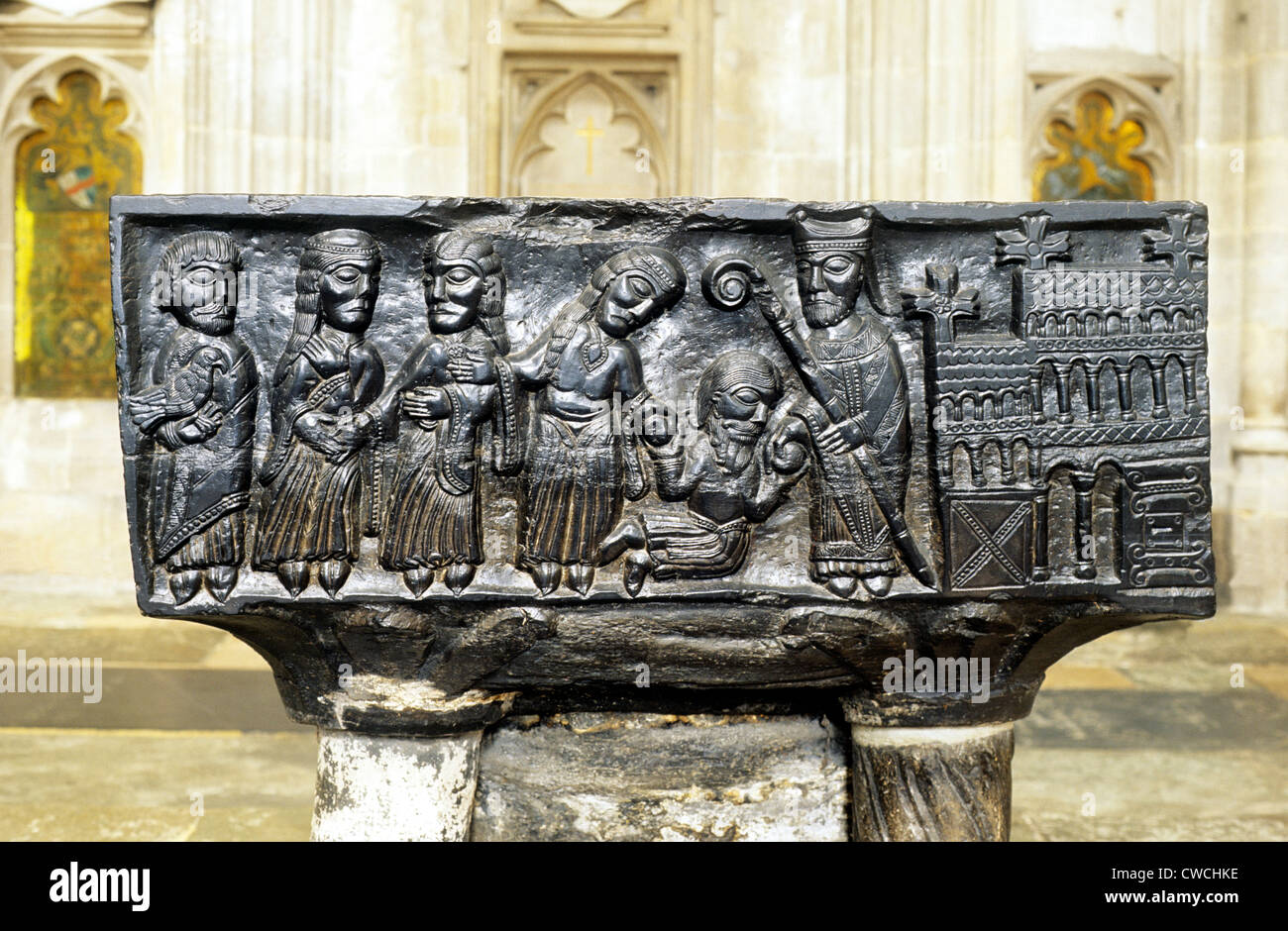Winchester Cathedral, black marble Tournai Norman Font , 12th century Scenes from the Life of St. Nicholas Saint Santa Claus Stock Photo