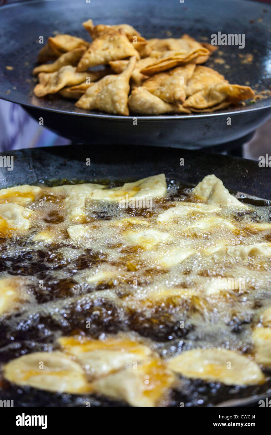 Deep frying samosas, Islamabad, Pakistan Stock Photo Alamy