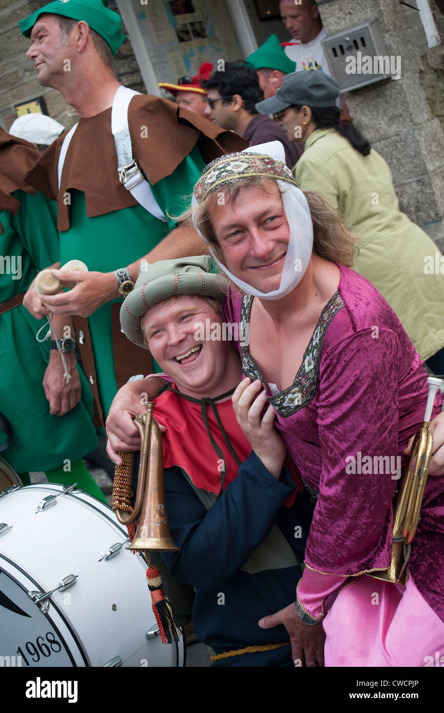 Two members of the Fowey town band dressed up for the carnival celebrations, 2012 Stock Photo