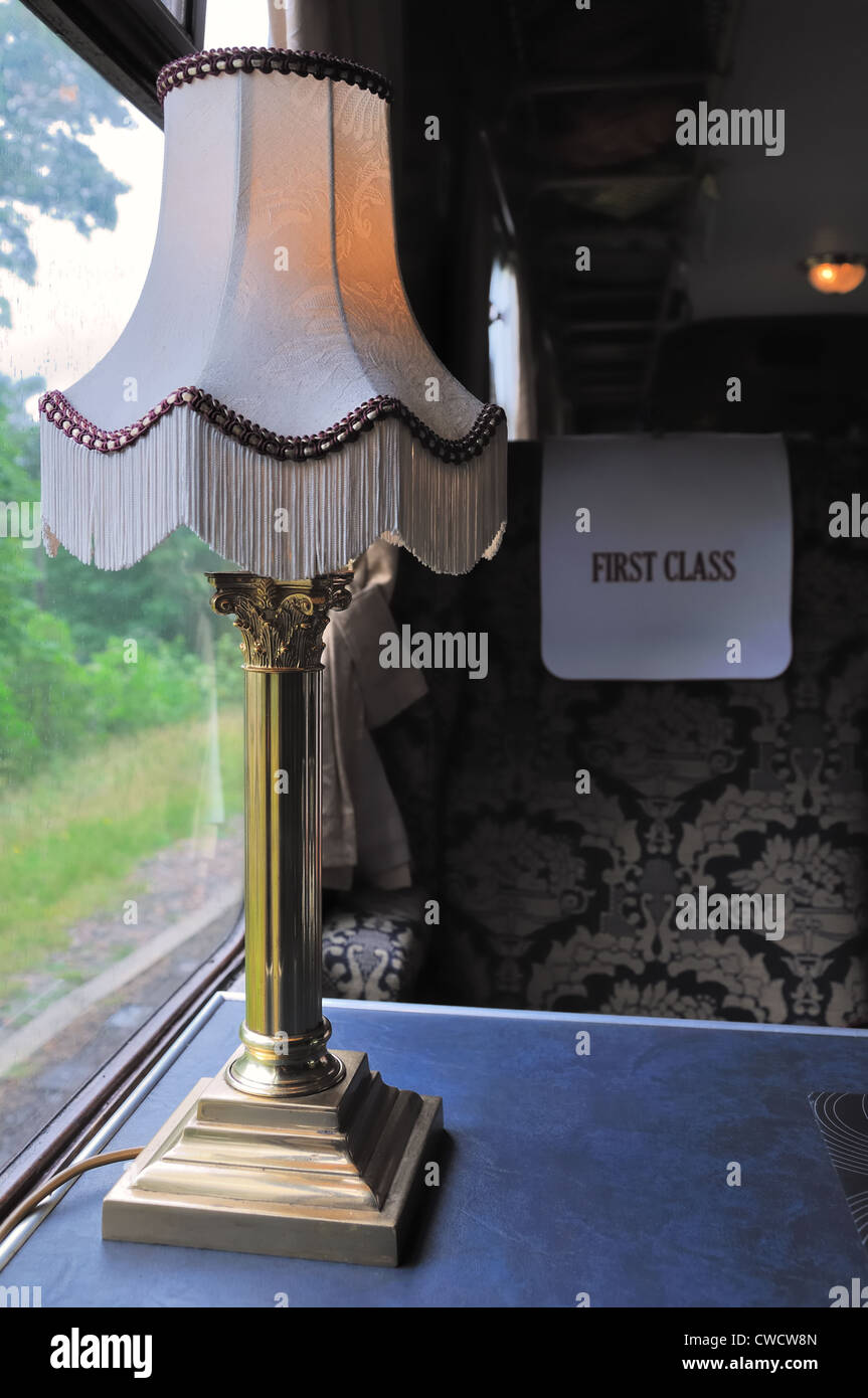 First class seat at window of the 'Hogwarts Express' 'Jacobite' steam train in Scotland, UK Stock Photo