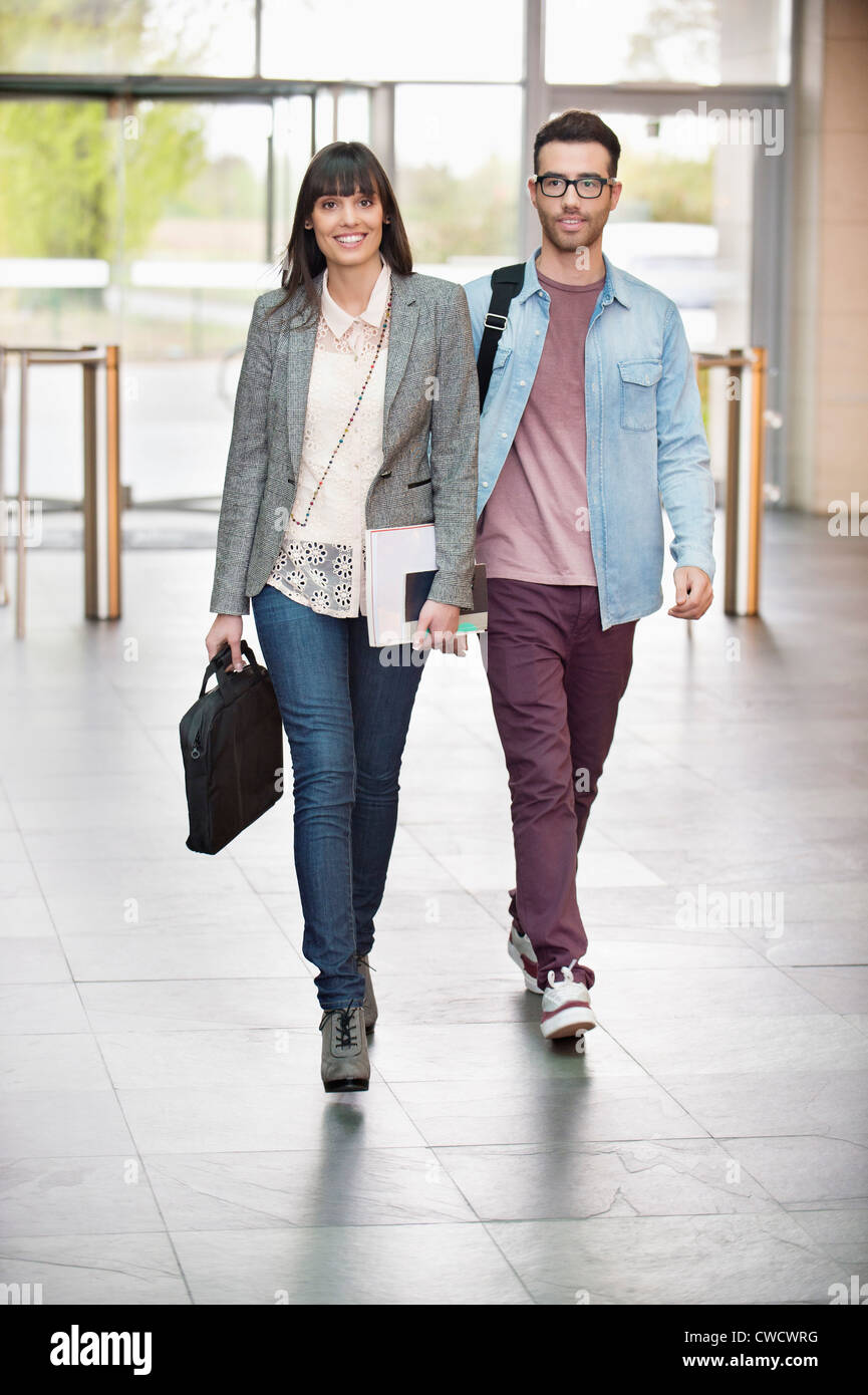 Business executives entering in an office lobby Stock Photo - Alamy