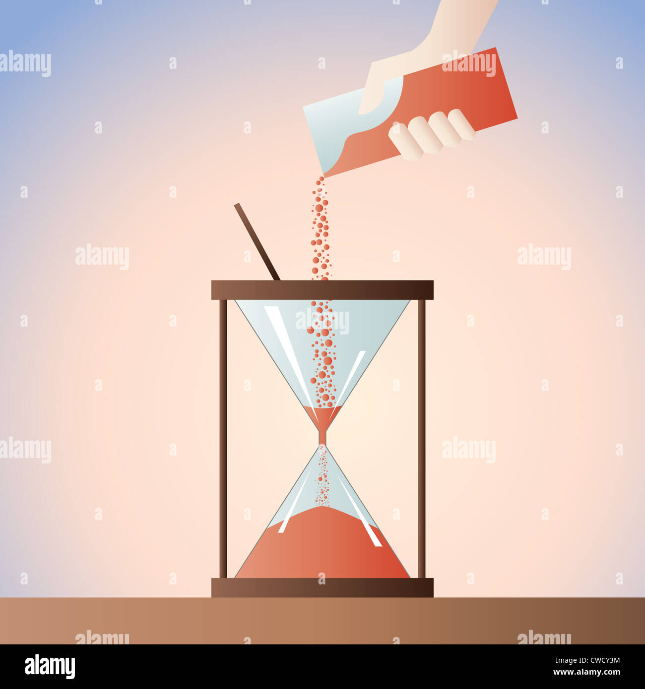 Hand pouring additional time sand into the sand timer Stock Photo - Alamy