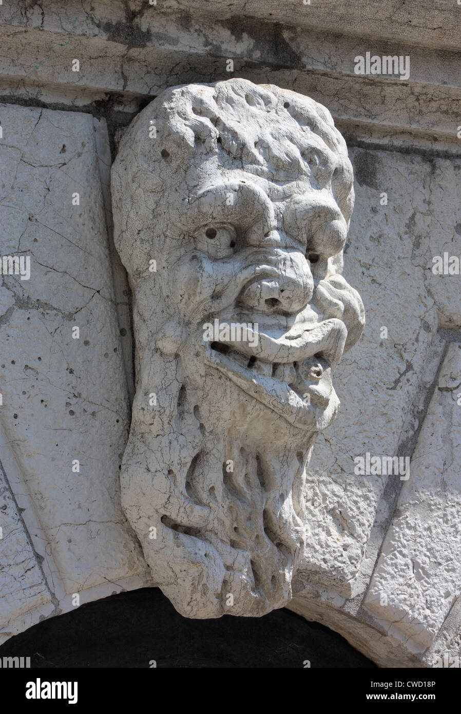 The mascaron stone face of Santa Maria Formosa chuch. Stock Photo