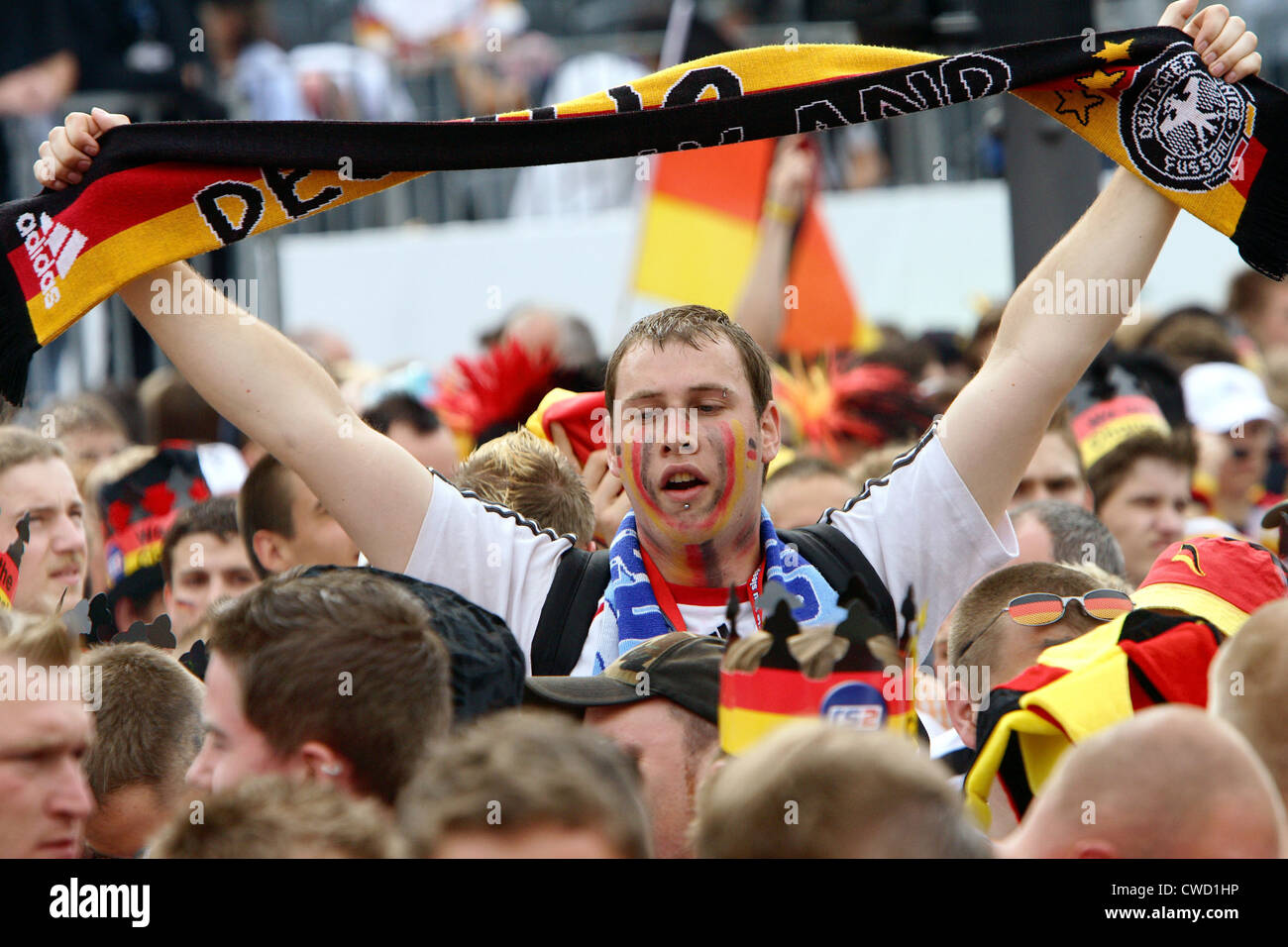 Football fans at the fan mile in front of the Brandenburg Gate, Berlin Stock Photo