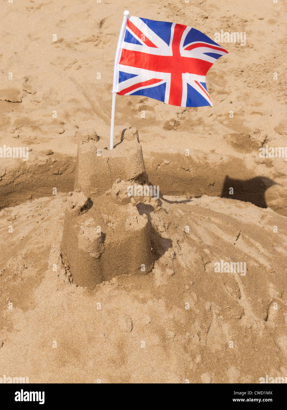 Union Jack sandcastle British beach holiday Stock Photo