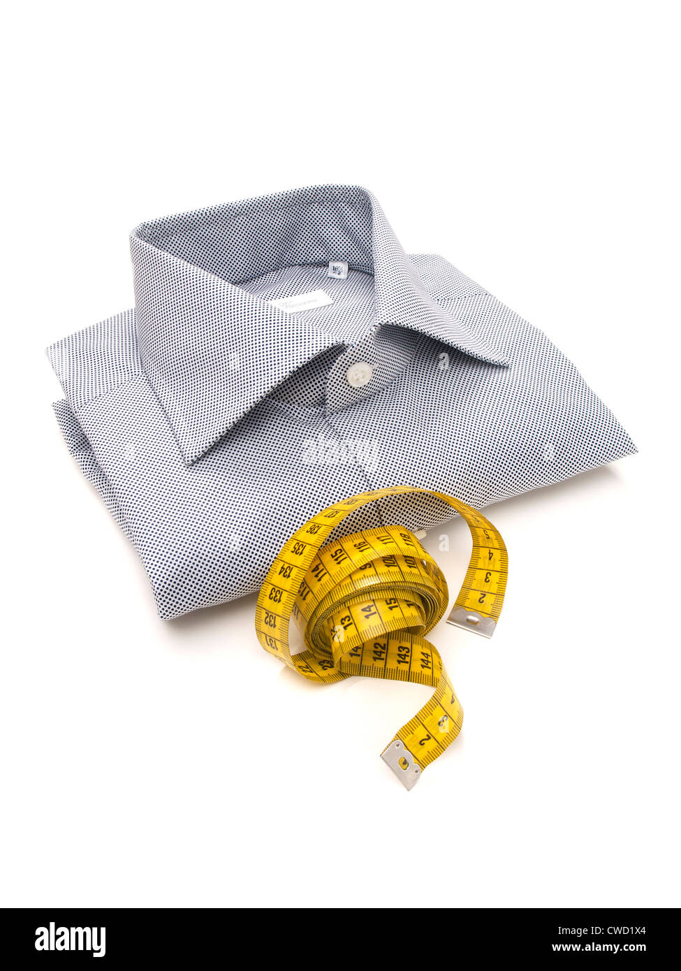 Blue and white mens shirt with yellow tape measure on white background Stock Photo