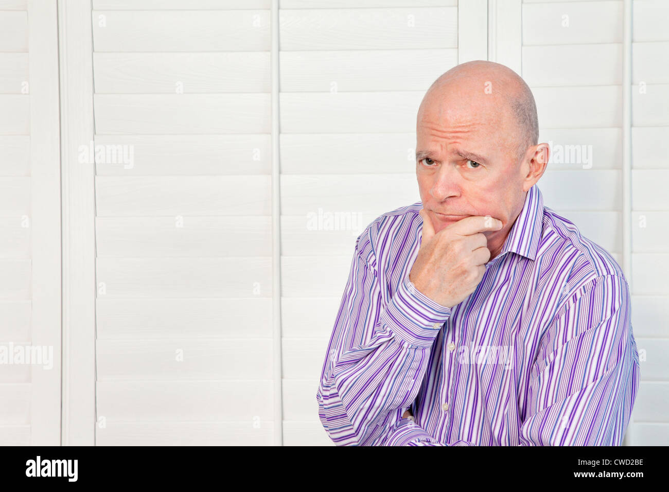Man bald chin pensive hi-res stock photography and images - Alamy