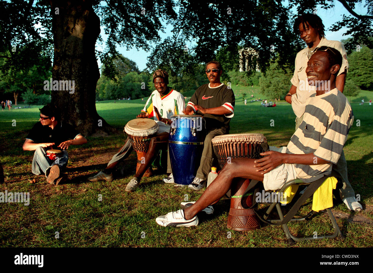 Muenchen, musicians play drums Stock Photo Alamy