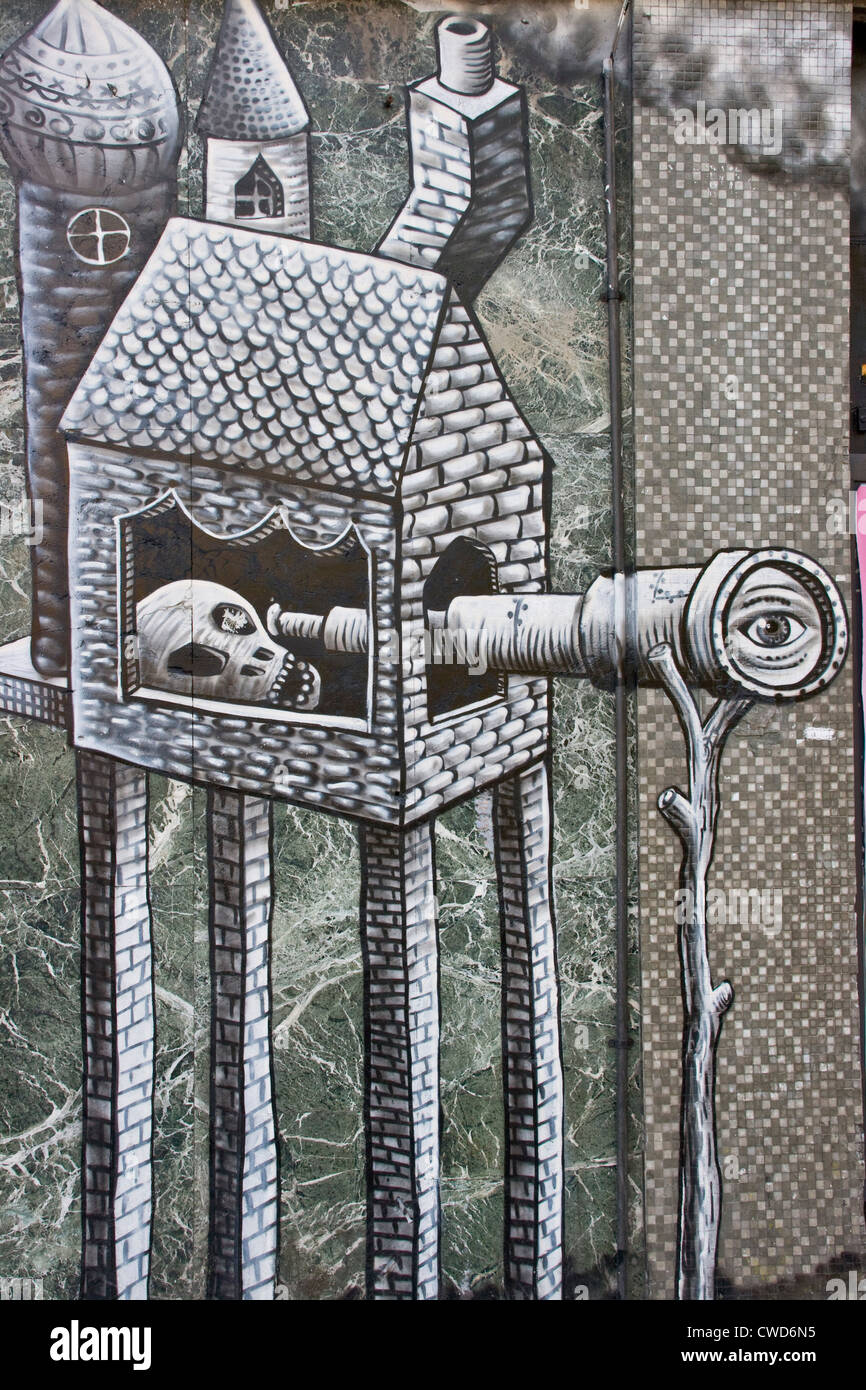 Graphic urban graffiti wall street art illustration of a skull east London England Europe Stock Photo