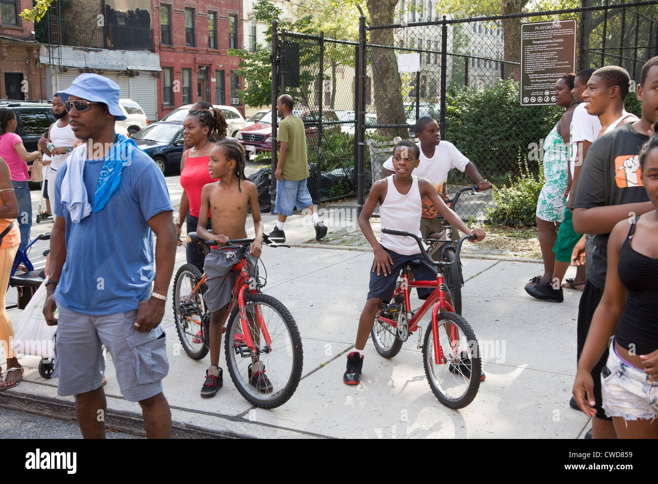 People and sights seen along the way of the Universal Hip Hop Parade in the Bedford Stuyvesant neighborhood of Brooklyn, NY Stock Photo
