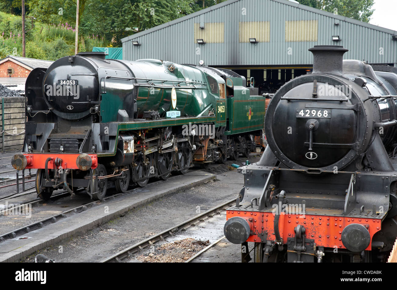 Severn Valley Railway, Shropshire, England. Bridgenorth engined shed - rebuilt Bulleid Pacific 'Sir Keith Park' & Stanier 8F Stock Photo