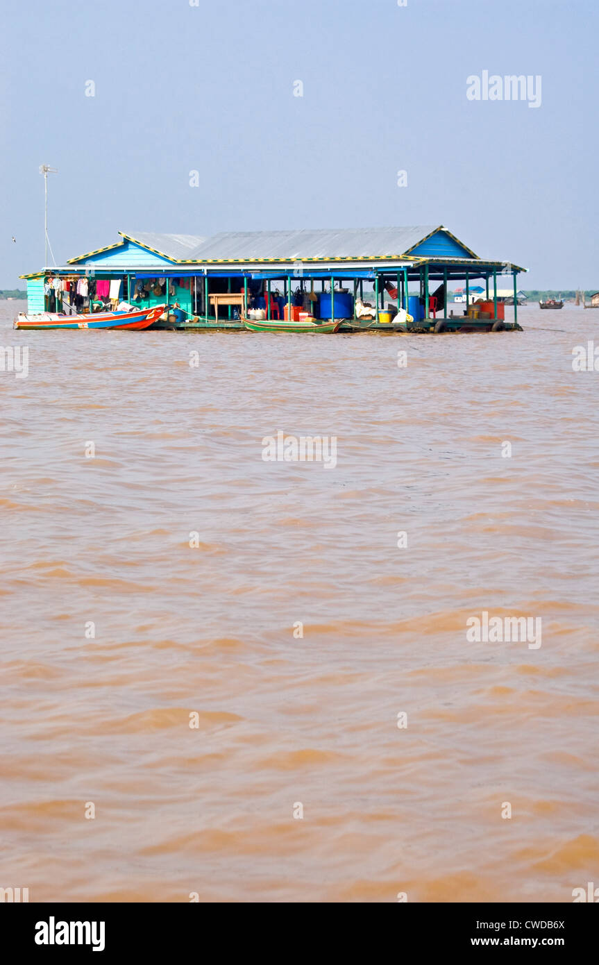 Vertical wide angle view of a floating house of Kompong Khleang, the floating village on Tonle Sap Lake in Cambodia Stock Photo