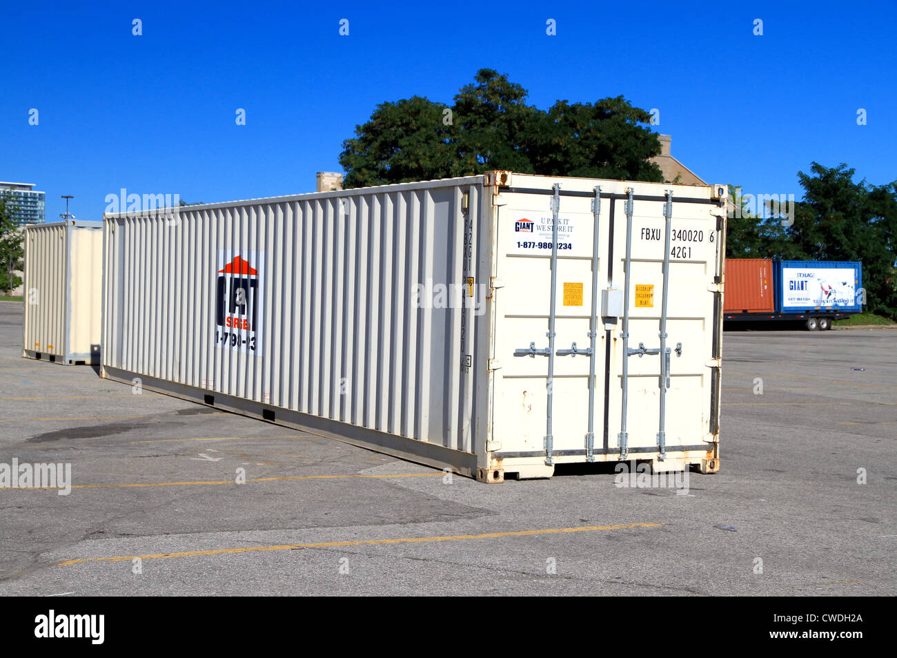 A metal container outside an industrial facility Stock Photo - Alamy