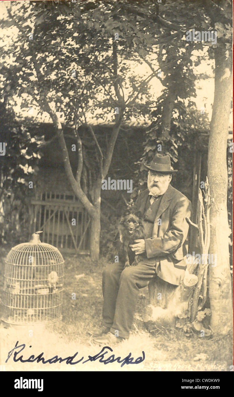 signed postcard of Richard Sharpe with his pets in the garden at The Jubilee Stamp House, Bersted, Stock Photo