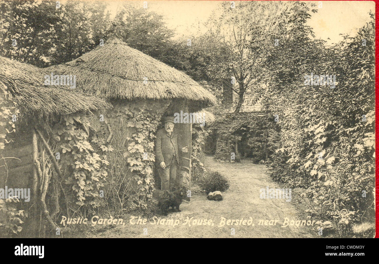 postcard of the Rustic Garden at The Stamp House with owner Richard Sharpe and pet dog Stock Photo