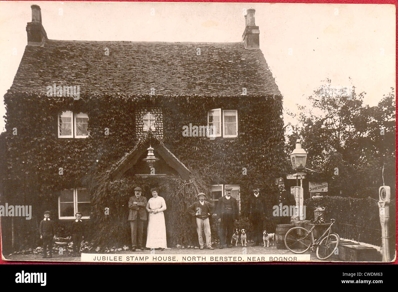 Postcard of Jubilee Stamp House with owner, wife and staff Stock Photo