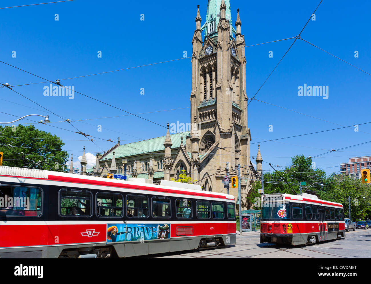 Trams in front of St James Cathedral, Toronto, Ontario, Canada Stock Photo
