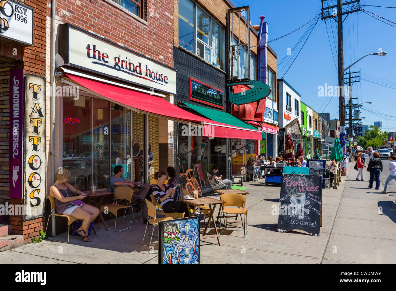 Shops and cafes on Augusta Avenue in the Kensington Market district, Toronto, Ontario, Canada Stock Photo