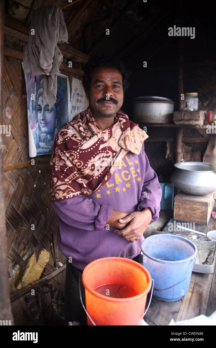 The seller of tea posing in his tea shop in Kumrokhali, West Bengal, India January 14, 2009. Stock Photo