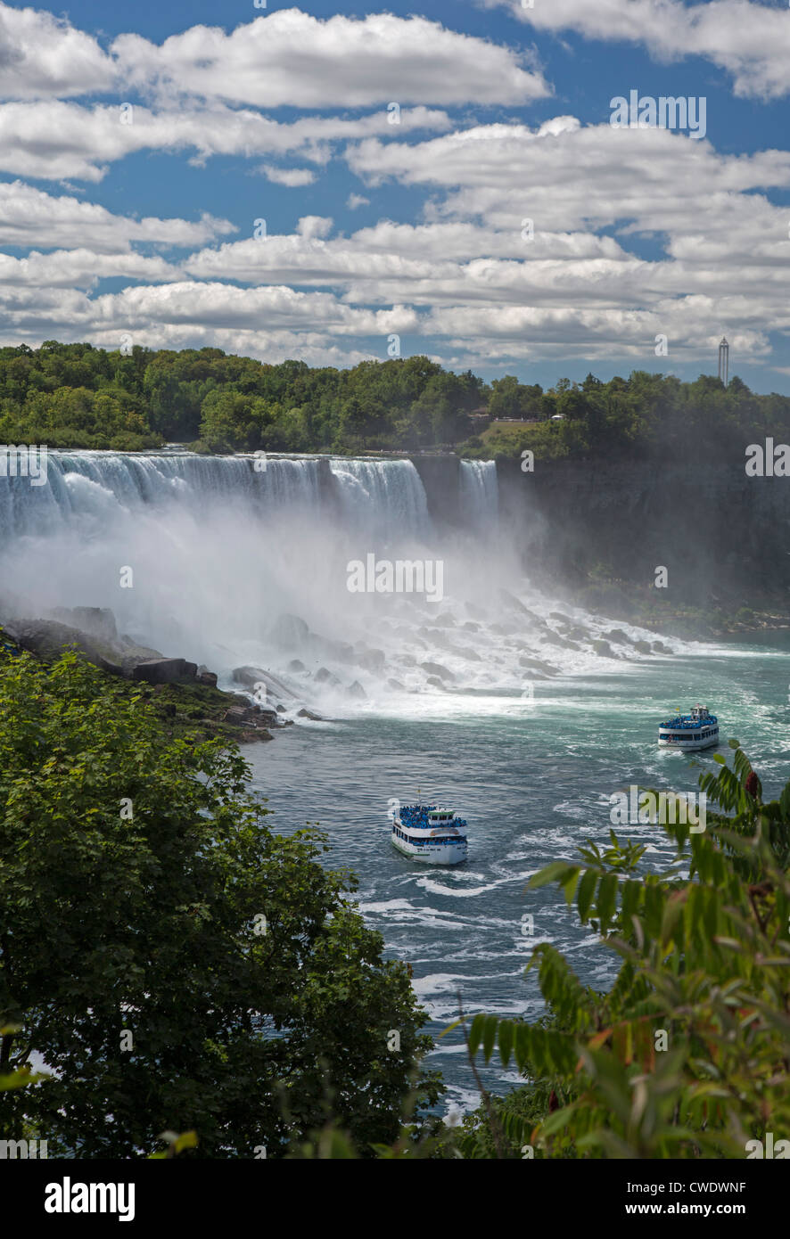 Niagara Falls, Ontario - Niagara Falls. Two boats in the Maid of the Mist fleet carry tourists to the edge of the falls. Stock Photo
