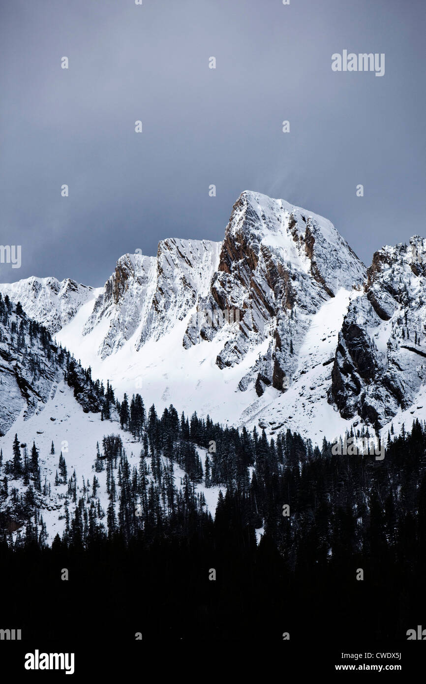 A view of jagged peaks covered in snow in Montana. Stock Photo