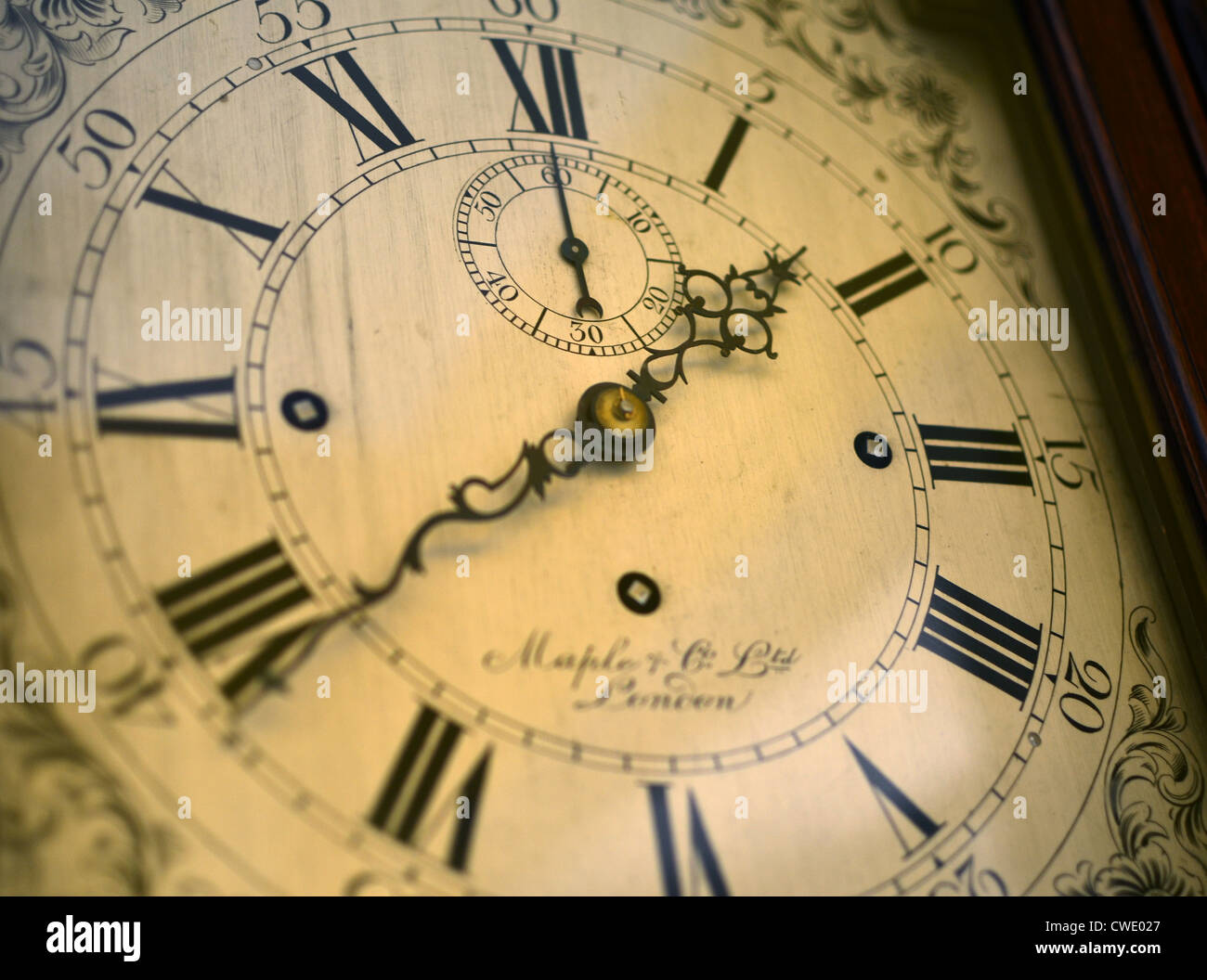 Old 'Maple & Co Ltd' clock face (9:40 Stock Photo - Alamy