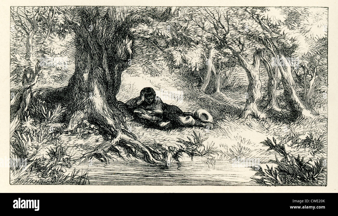 A Hymn - Summer by J Gilbert. A young man reading a book by a river under the shade of a tree on a summers day. Stock Photo