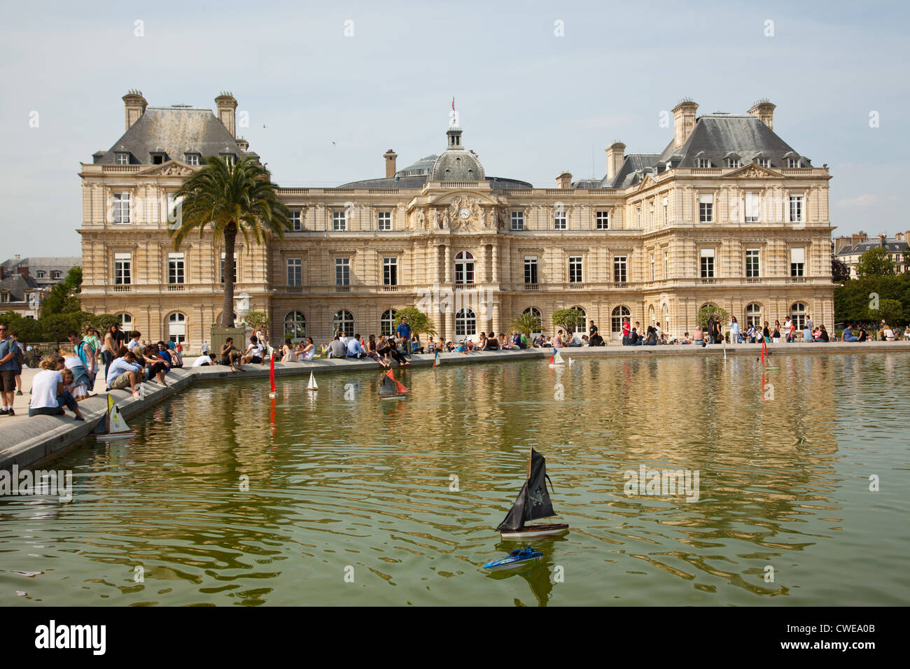 Visitors enjoying the lake in Jardin du Luxembourg in Paris Stock Photo