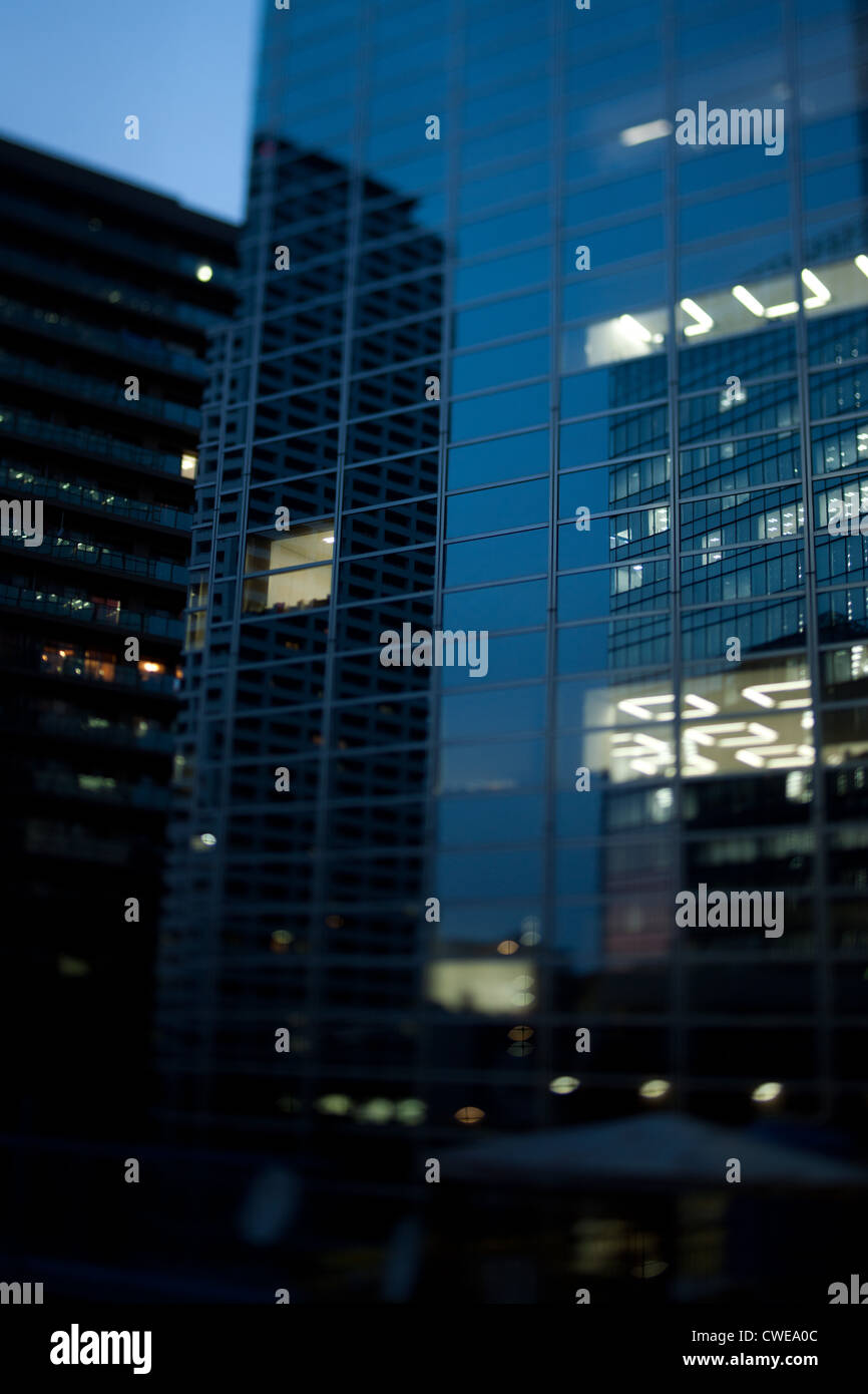 Multistory Glass Building At Dusk Stock Photo