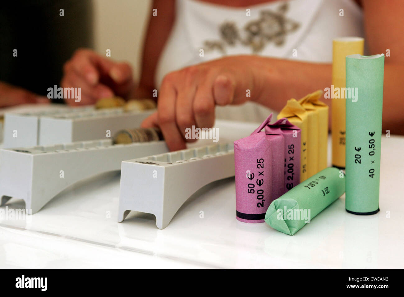 Bad Doberan, coins are counted and rolled Stock Photo