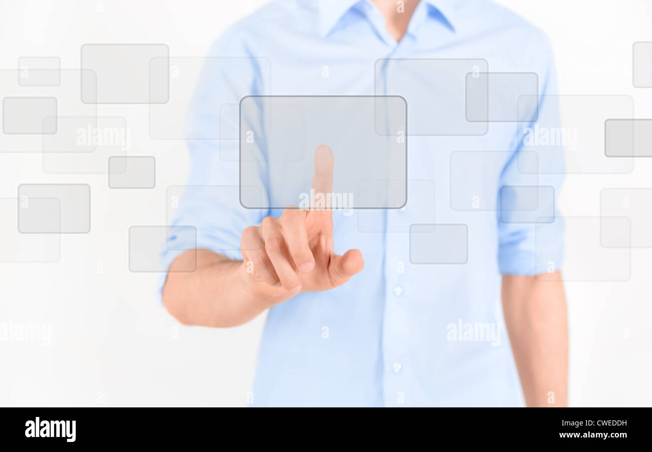 Man touching blank virtual screen. Isolated on white. Stock Photo
