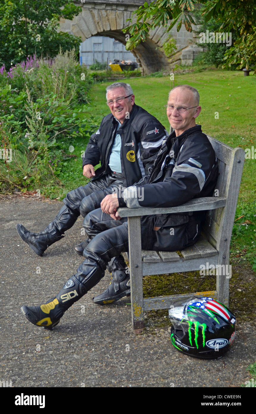 two senior citizen bikers taking a rest Stock Photo