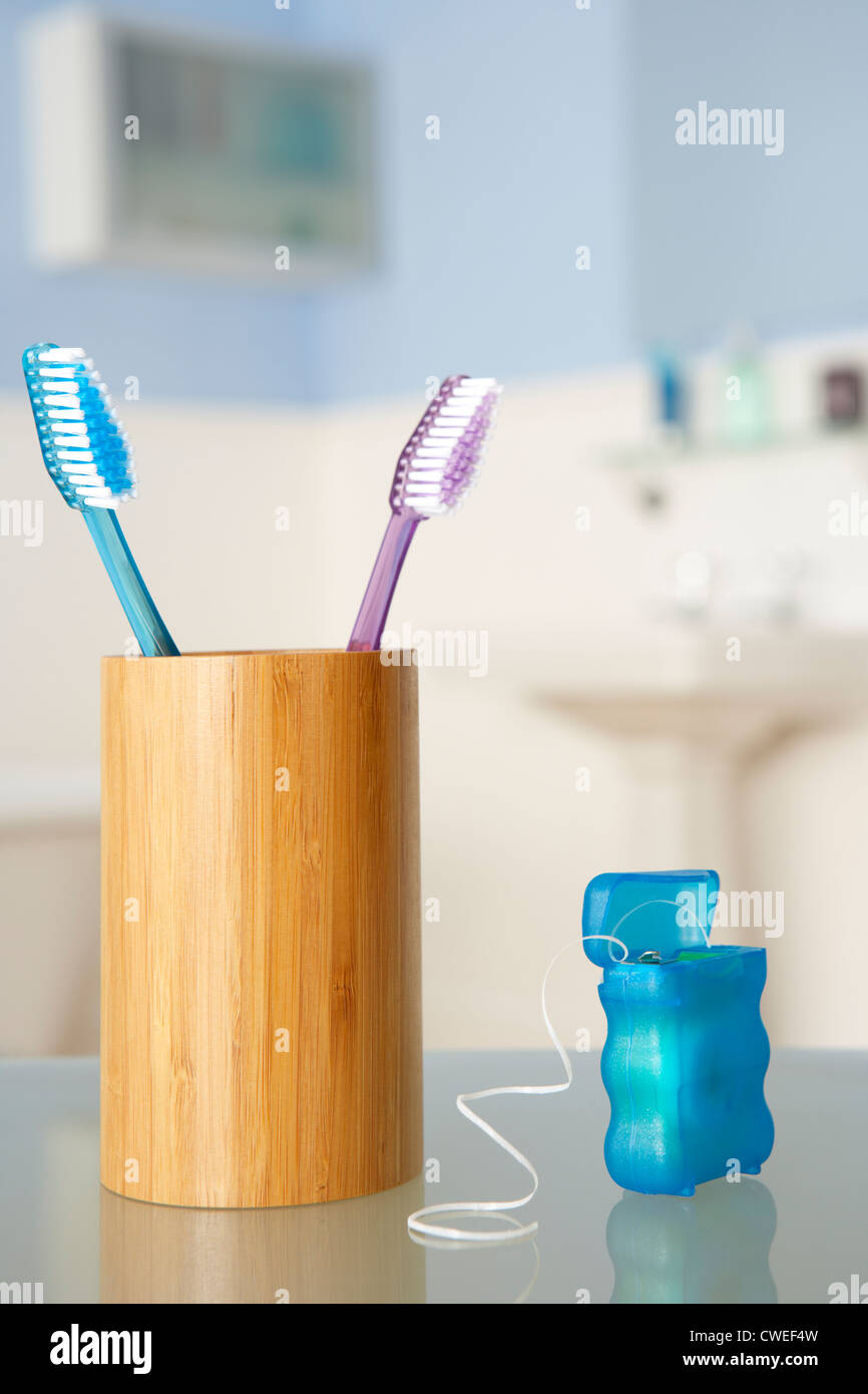 Toothbrushes and dental floss Stock Photo