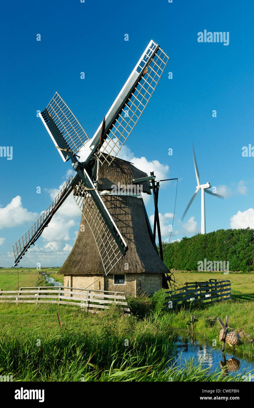 De Snip windmill and wind turbine, near Workum, Friesland, Netherlands Stock Photo