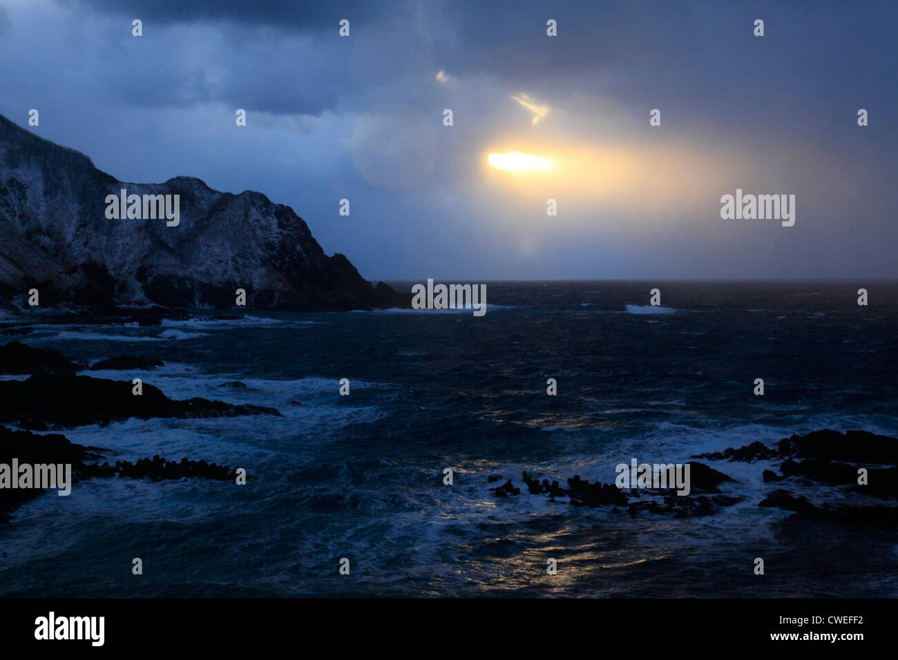 Sunset View Of Coast With Rocks And Waves Stock Photo