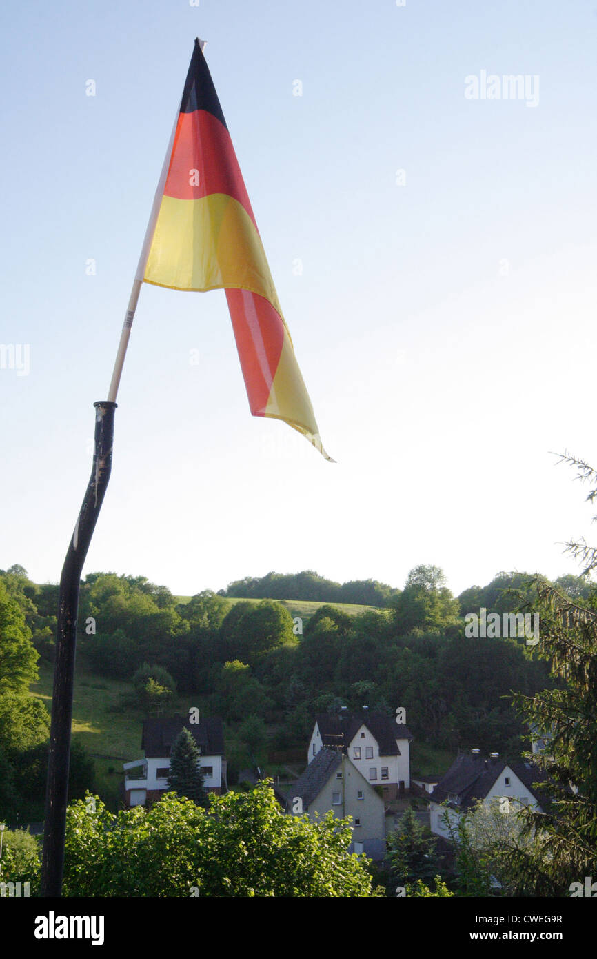 Germany flag over a small village Stock Photo