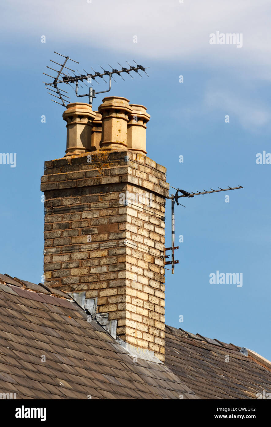 Terrestrial or digital television aerial on house chimney Stock Photo