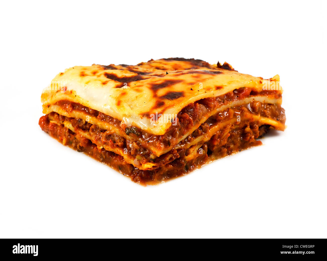 An isolated traditional lasagna made with minced beef bolognese sauce and three layers of pasta, lasagne in English Stock Photo