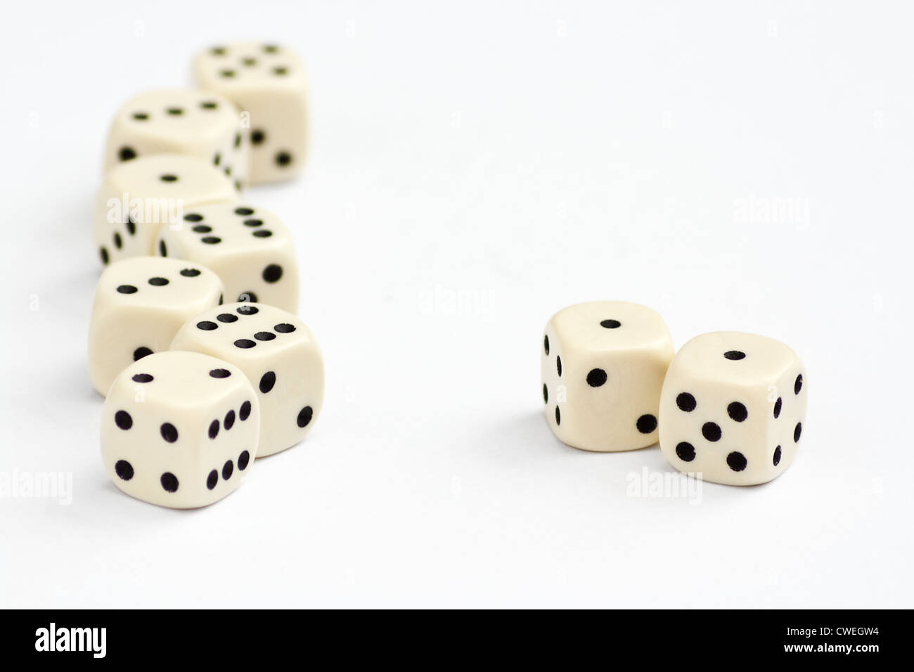 White dice frame edge with focus on double one or snake eyes Stock Photo