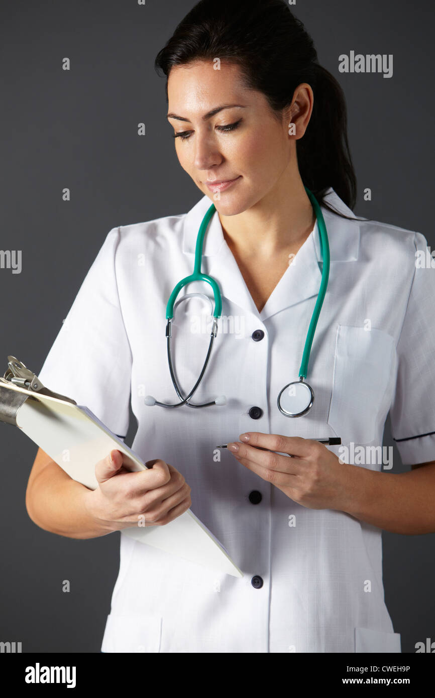 American nurse with stethoscope and clipboard Stock Photo