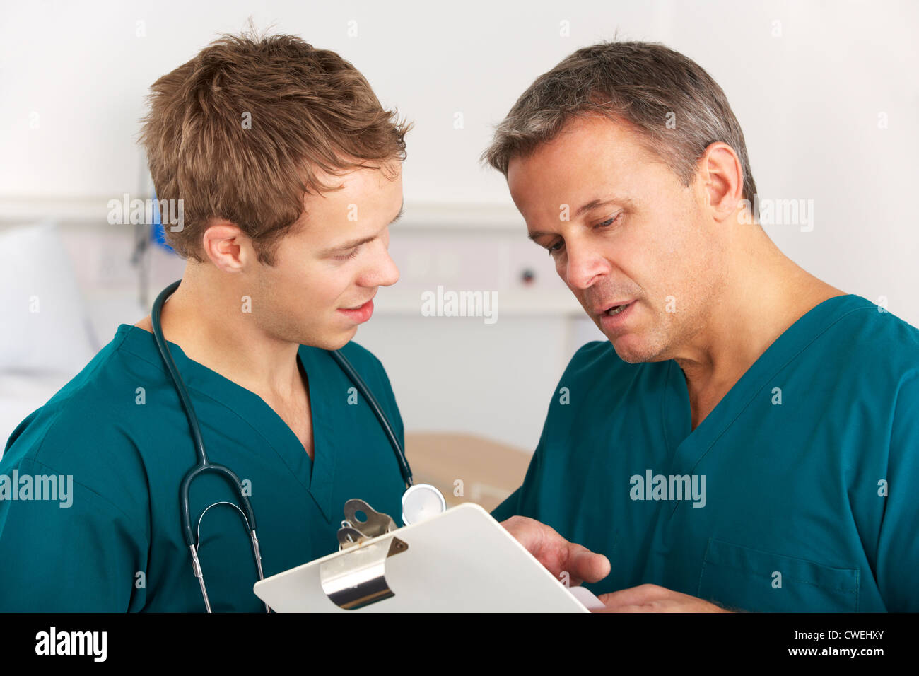 Medical staff working on hospital ward Stock Photo