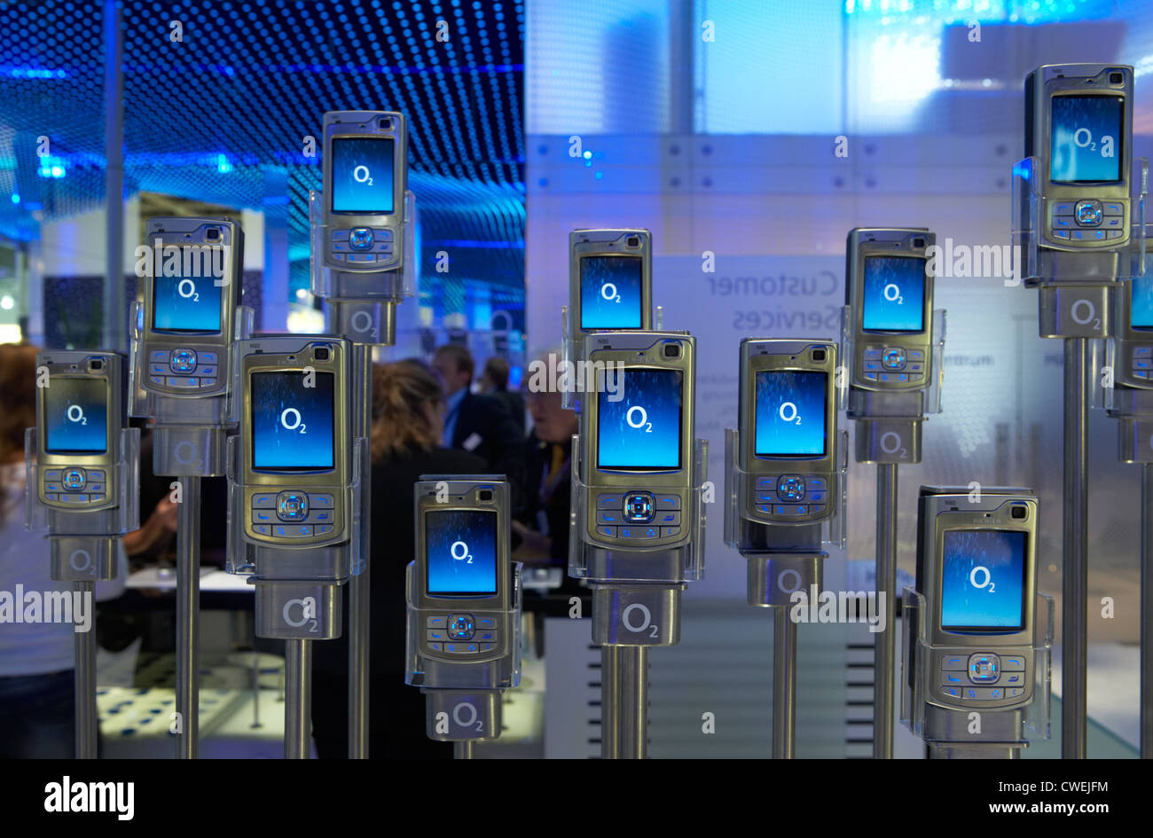 Mobile phones on Stahlstaeben at the stand of mobile phone company O2 ...