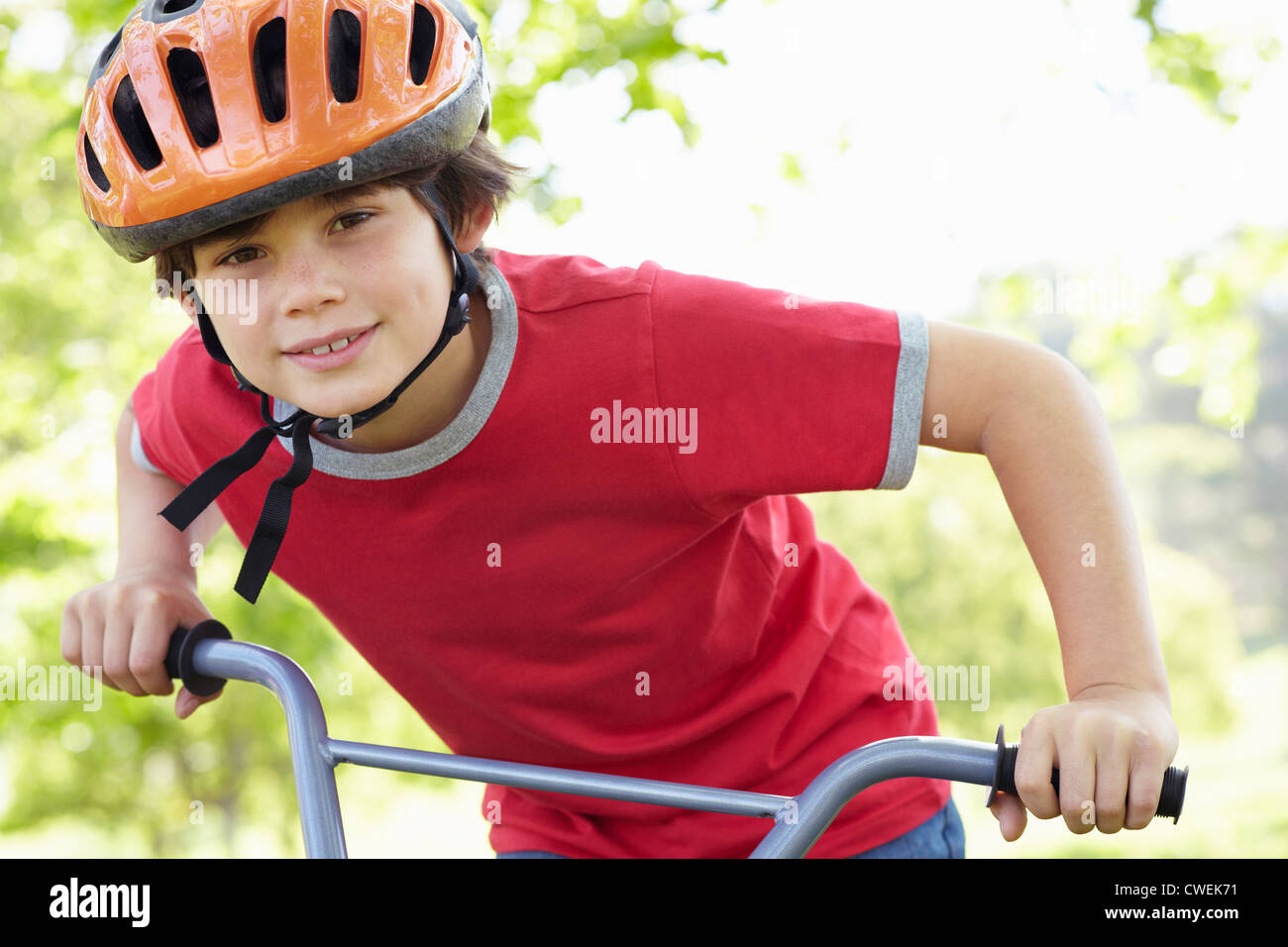 Boy riding bike Stock Photo Alamy