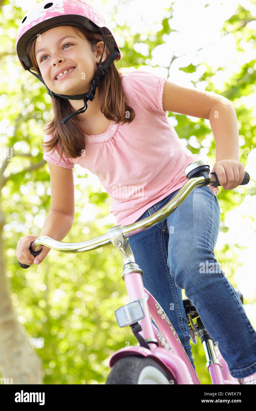 Girl riding bike Stock Photo - Alamy